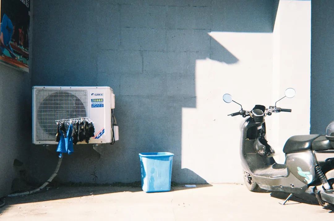 AC tune-up service on residential outdoor unit in Houston