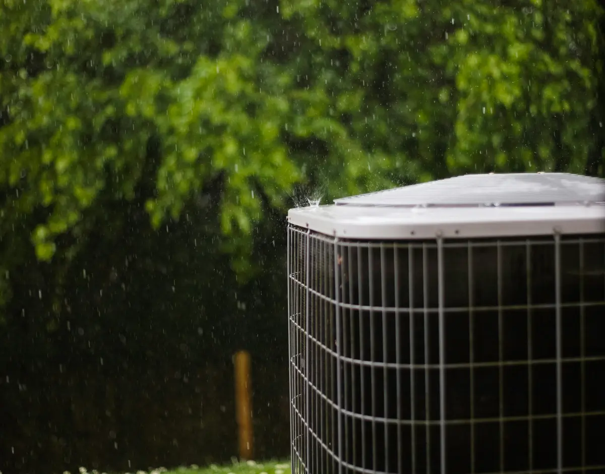 Residential outdoor AC condenser installed at a Houston home