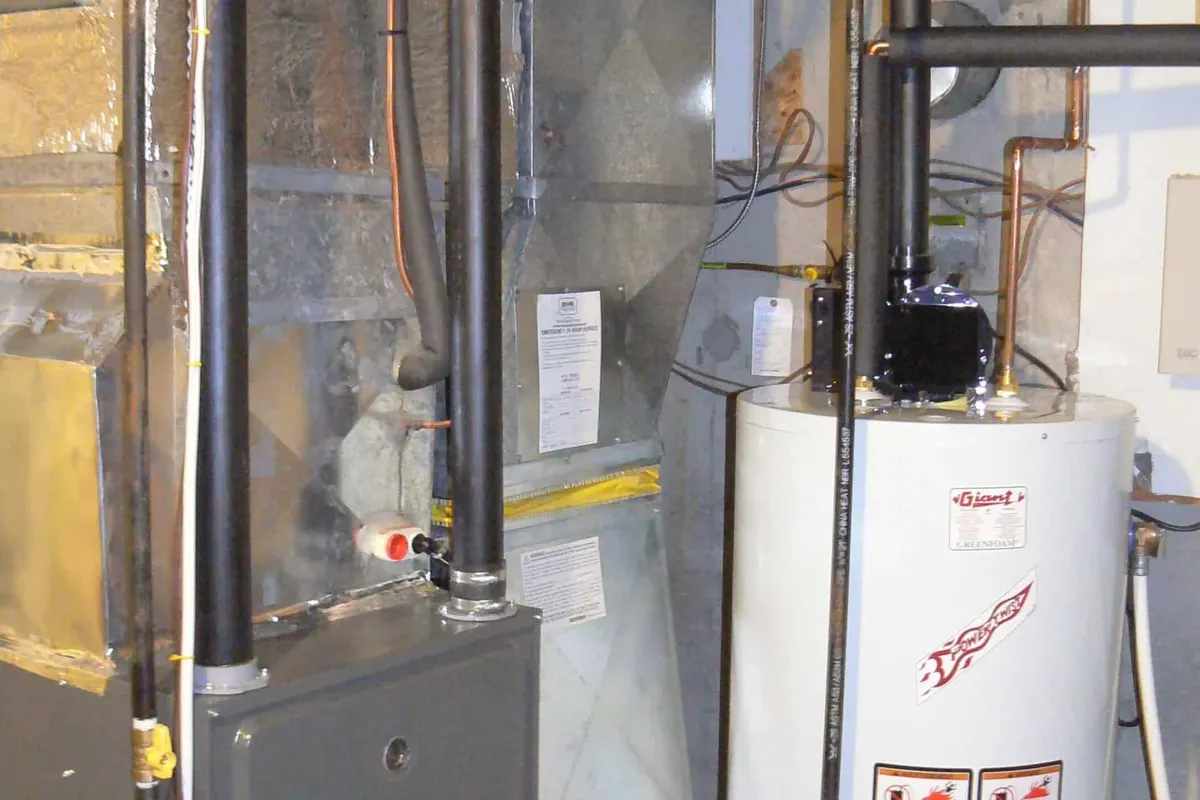 New high-efficiency gas furnace installed in a Houston basement mechanical room
