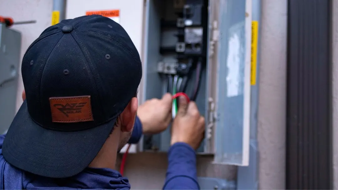 Houston Air Conditioning technician installing a high-efficiency furnace