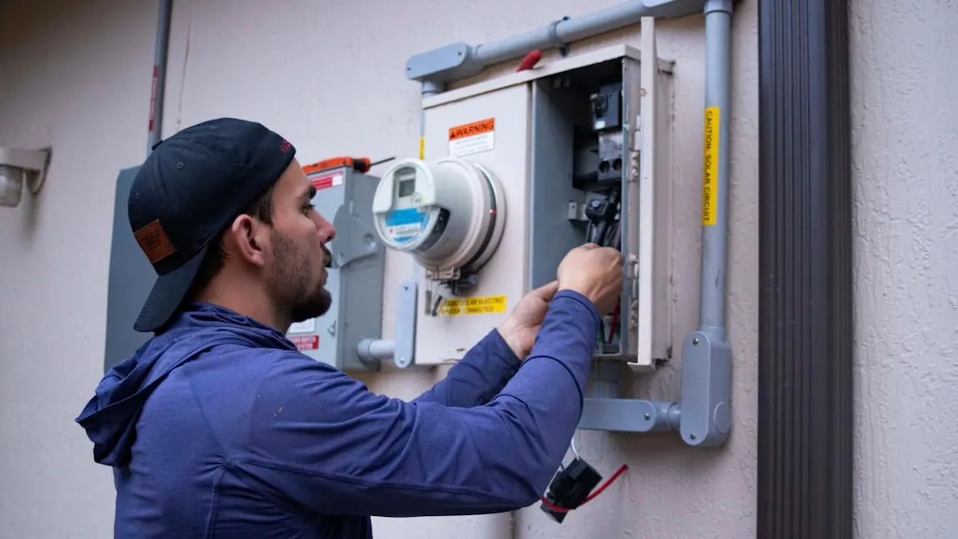 HVAC technician on a maintenance plan visit in Houston